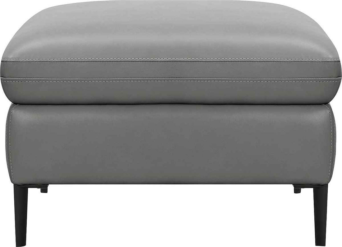 Otoman modern tapitat din piele ecologica, culoare gri, design elegant cu picioare metalice, confort sporit si aspect premium pentru living sofisticat